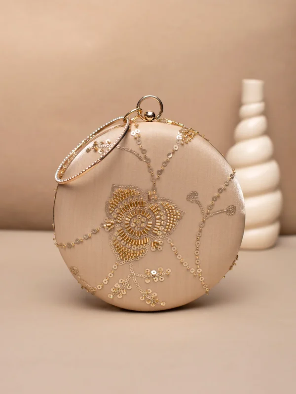 women designer clutches10 Designer Round Ethnic Clutch