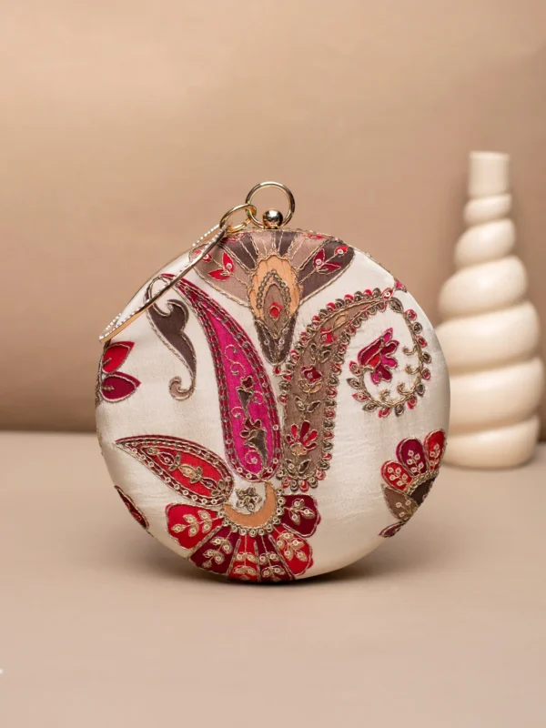 women designer clutches11 Designer Round Ethnic Clutch