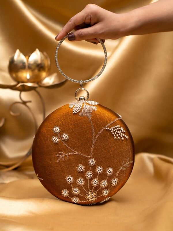 women designer clutches12 Designer Round Ethnic Clutch