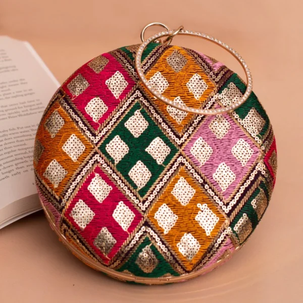 women designer clutches128 Designer Round Ethnic Clutch