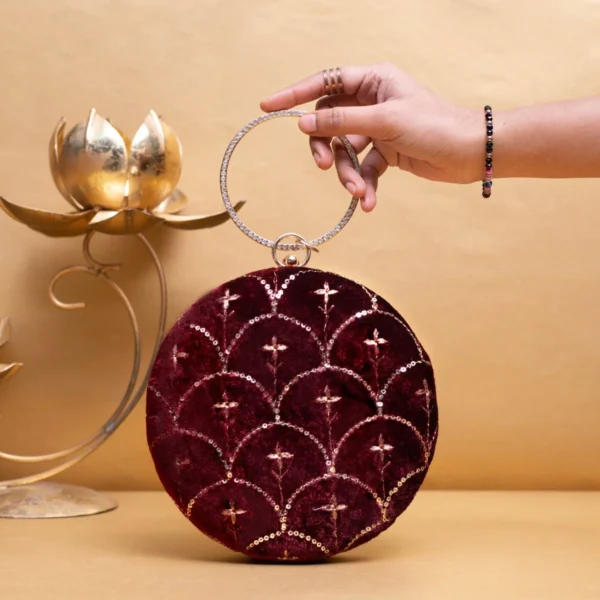 women designer clutches13 Designer Round Ethnic Clutch