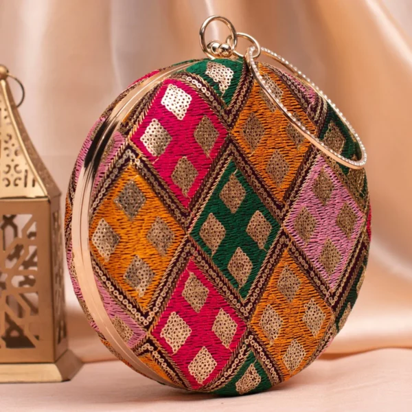 women designer clutches139 Designer Round Ethnic Clutch