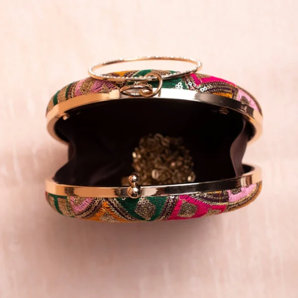 women designer clutches148 Designer Round Ethnic Clutch