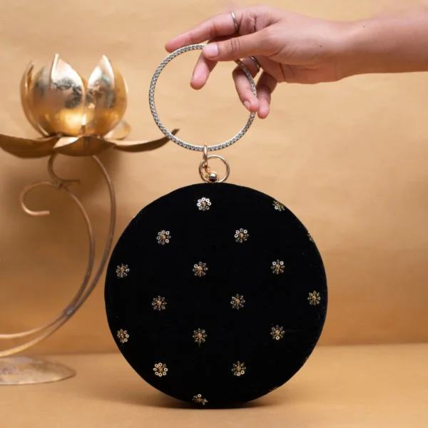 women designer clutches16 Designer Round Ethnic Clutch