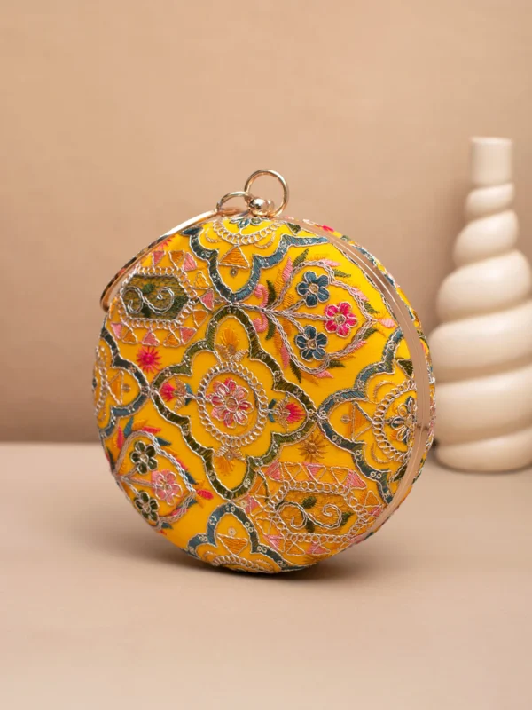 women designer clutches18 Designer Round Ethnic Clutch