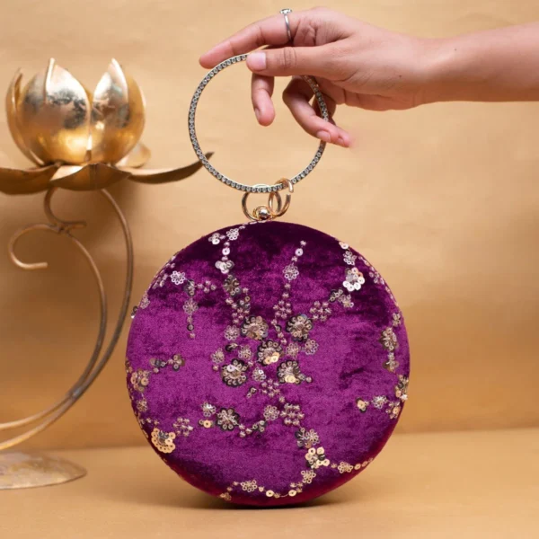 women designer clutches18 Designer Round Ethnic Clutch