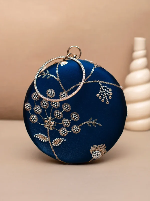 women designer clutches2 Designer Round Ethnic Clutch
