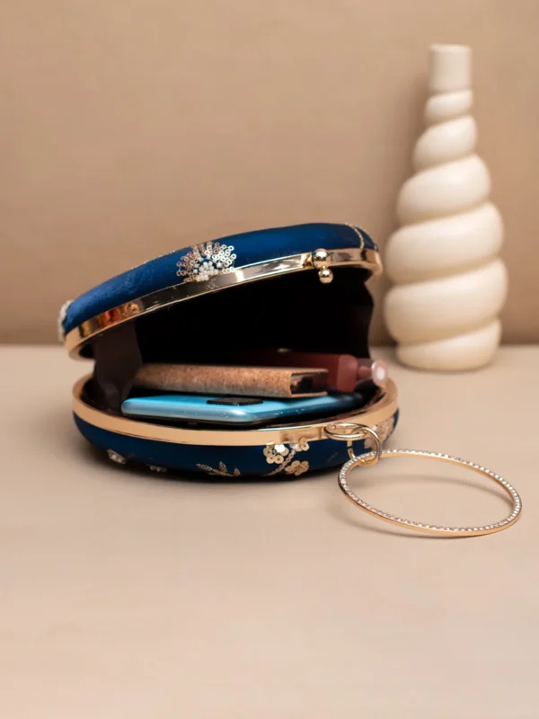 women designer clutches28 Designer Round Ethnic Clutch