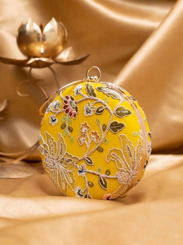 women designer clutches32 Designer Round Ethnic Clutch