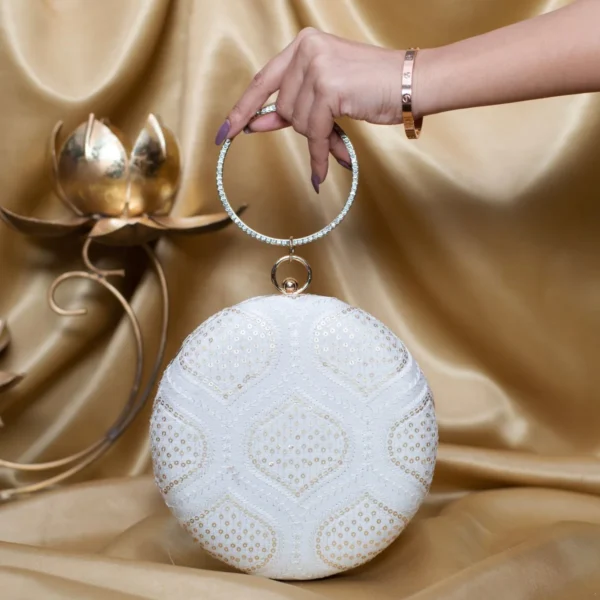 women designer clutches47 Designer Round Ethnic Clutch