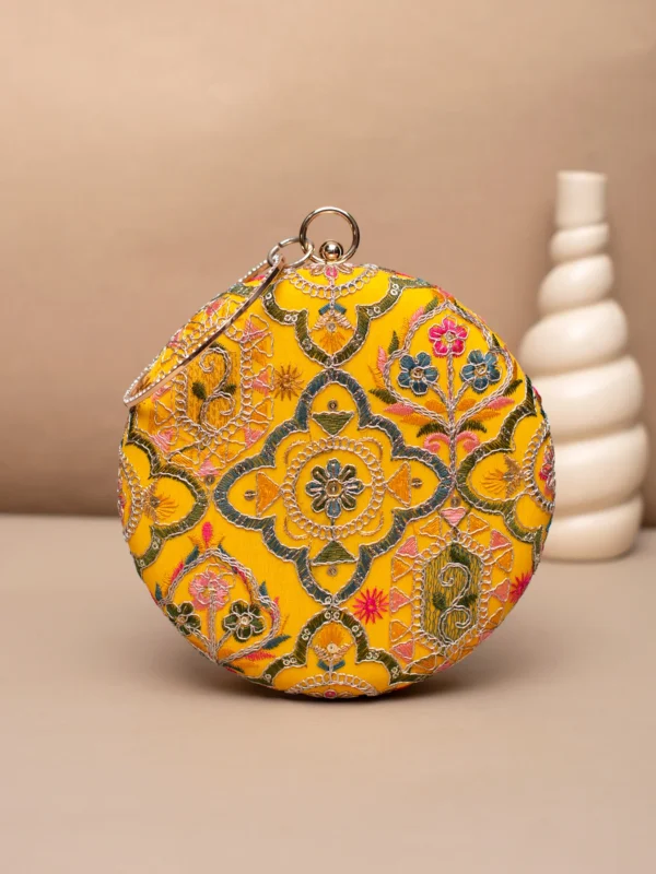 women designer clutches5 Designer Round Ethnic Clutch