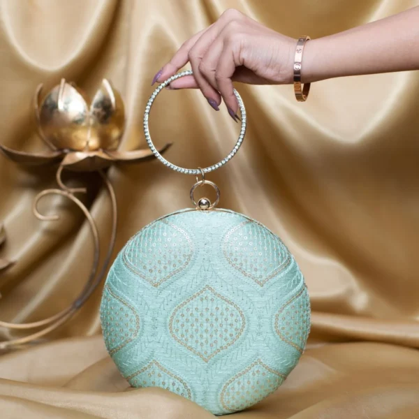 women designer clutches50 Designer Round Ethnic Clutch