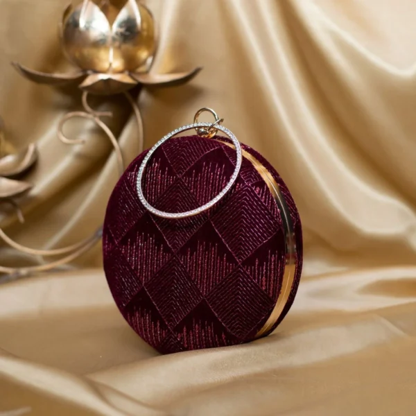 women designer clutches58 Designer Round Ethnic Clutch