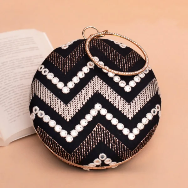 women designer clutches84 Designer Round Ethnic Clutch