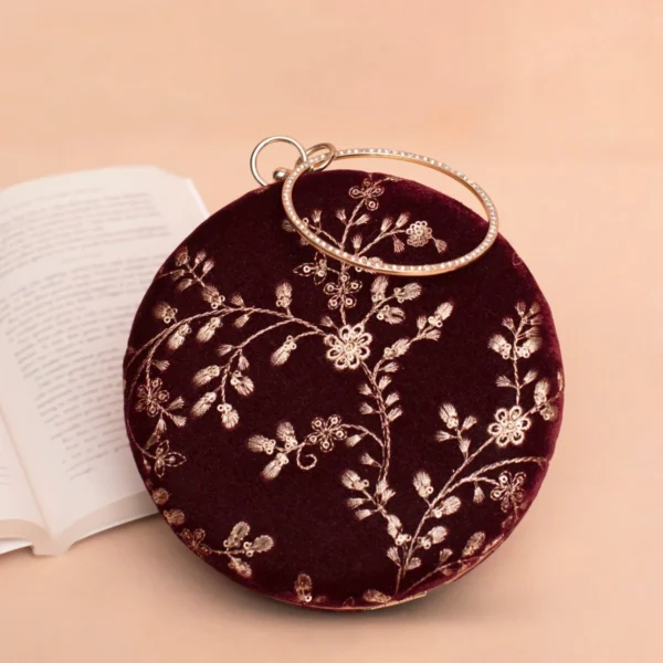 women designer clutches85 Designer Round Ethnic Clutch